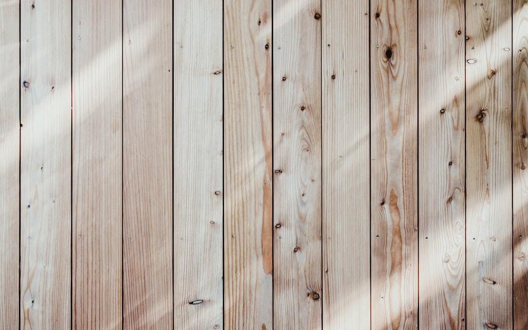 can you paint over stained wood exterior